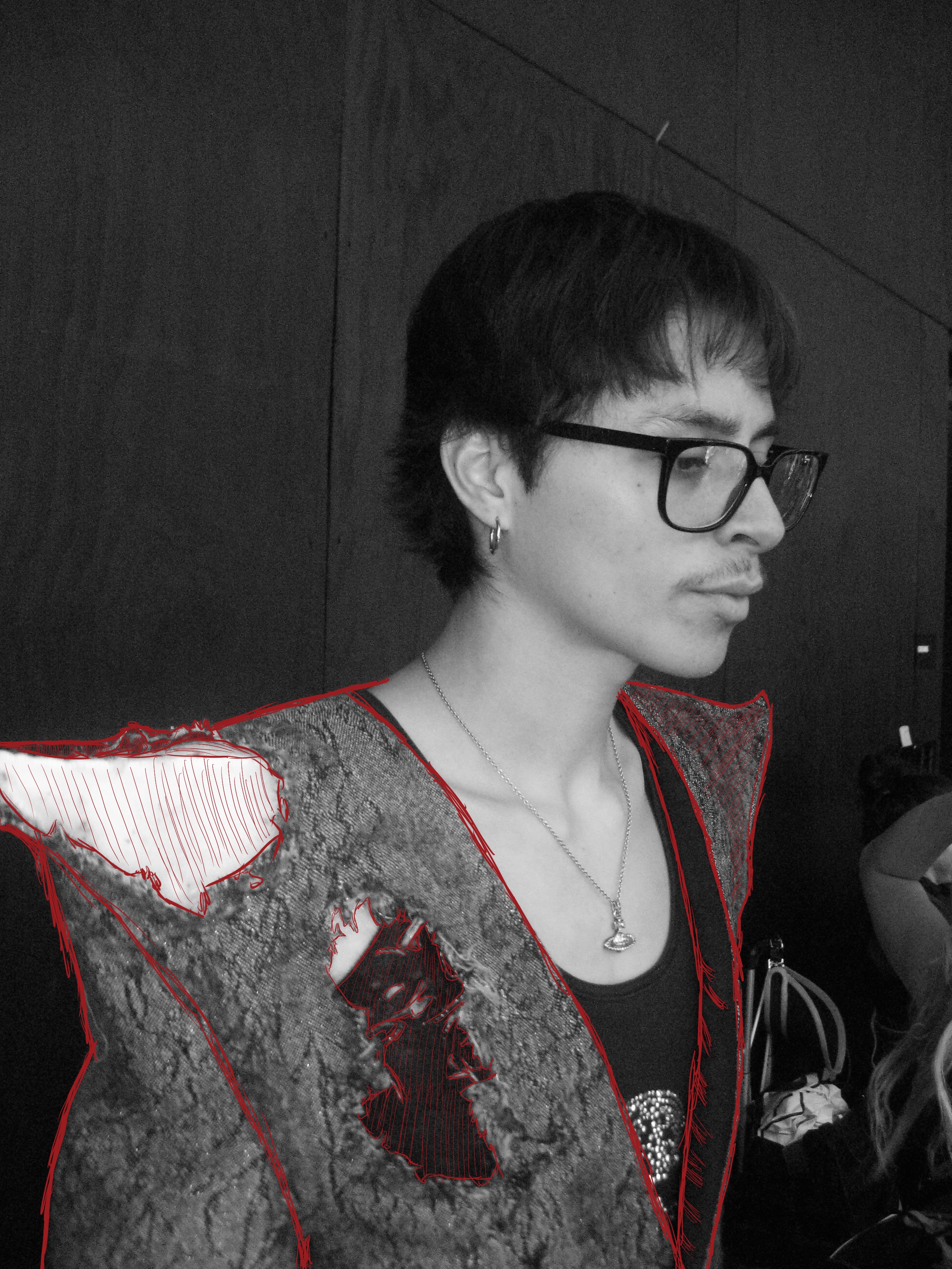 Model wearing a sculptural Eternal Bonds collection look outlined with red stitching